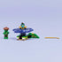 LEGO NINJAGO spinner build is displayed with a translucent purple spinning base, mutation monster figure, blue ninja minifigure, and launcher piece arranged neatly on a plain light background.