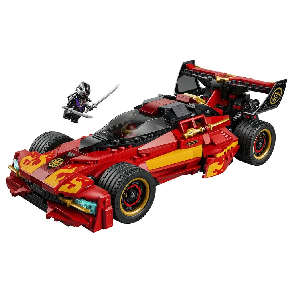 LEGO NINJAGO X-1 Ninja Charger in red, black and gold plastic features flame graphics, four large tires, a clear cockpit and rear spoiler, posed with a sword-wielding minifigure.