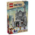LEGO One Piece Battle at Drum Castle 75645 box shows a gray, blue-gray, and white castle with six minifigures, labeled for ages 9+ with 1038 pieces against a snowy scene.