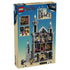 LEGO One Piece Battle at Drum Castle package back shows the gray brick castle opened to reveal furnished rooms, play scenes, six minifigures, and four random dossiers.
