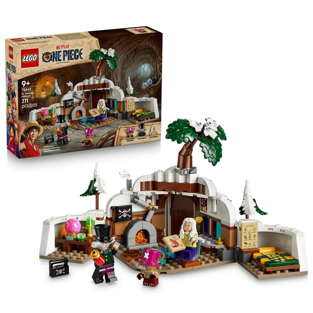 LEGO One Piece Dr. Hiriluk's Hideout set in white, brown and green plastic is displayed with its retail box, snowy cave room, flowering tree and three minifigures.