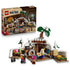 LEGO One Piece Dr. Hiriluk's Hideout set in white, brown and green plastic is displayed with its retail box, snowy cave room, flowering tree and three minifigures.