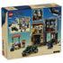 LEGO One Piece Showdown with Captain Smoker 75642 package back shows the modular Recruitment Center, green motorcycle, market stall, minifigures and play scenes.