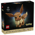 LEGO Pokémon Eevee model building kit features black retail packaging with character artwork, showcasing the brown and cream display figure, collector presentation and Pokémon branding.