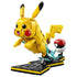 LEGO Pokémon Pikachu collectible model features bright yellow plastic bricks, a rounded creature form with red cheeks, black-tipped ears and lightning tail, displayed with a Poké Ball on a studio background.
