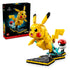 LEGO Pokémon Pikachu building kit features bright yellow plastic bricks, a rounded character form with black-tipped ears and red cheeks, posed beside a Poké Ball display and retail packaging on a light studio background.