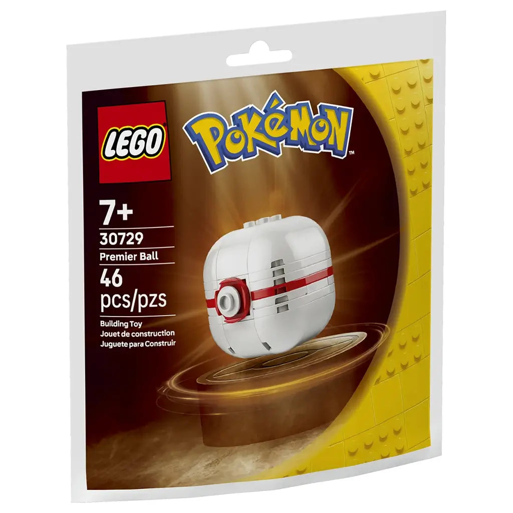 LEGO Pokémon Premier Ball 30729 package shows a white and red plastic brick Premier Ball against a glowing brown backdrop, labeled for ages 7+ with 46 pieces.