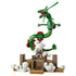 LEGO Pokémon Rayquaza model in green, red, and yellow plastic bricks curves above a tan shrine and white clouds, with a trainer minifigure centered on the steps.