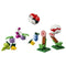 LEGO Pokémon Trainer Supplies set features red, white, green, purple, blue, and yellow plastic brick Poké Balls, berries, bottles, and two targets on a white background.
