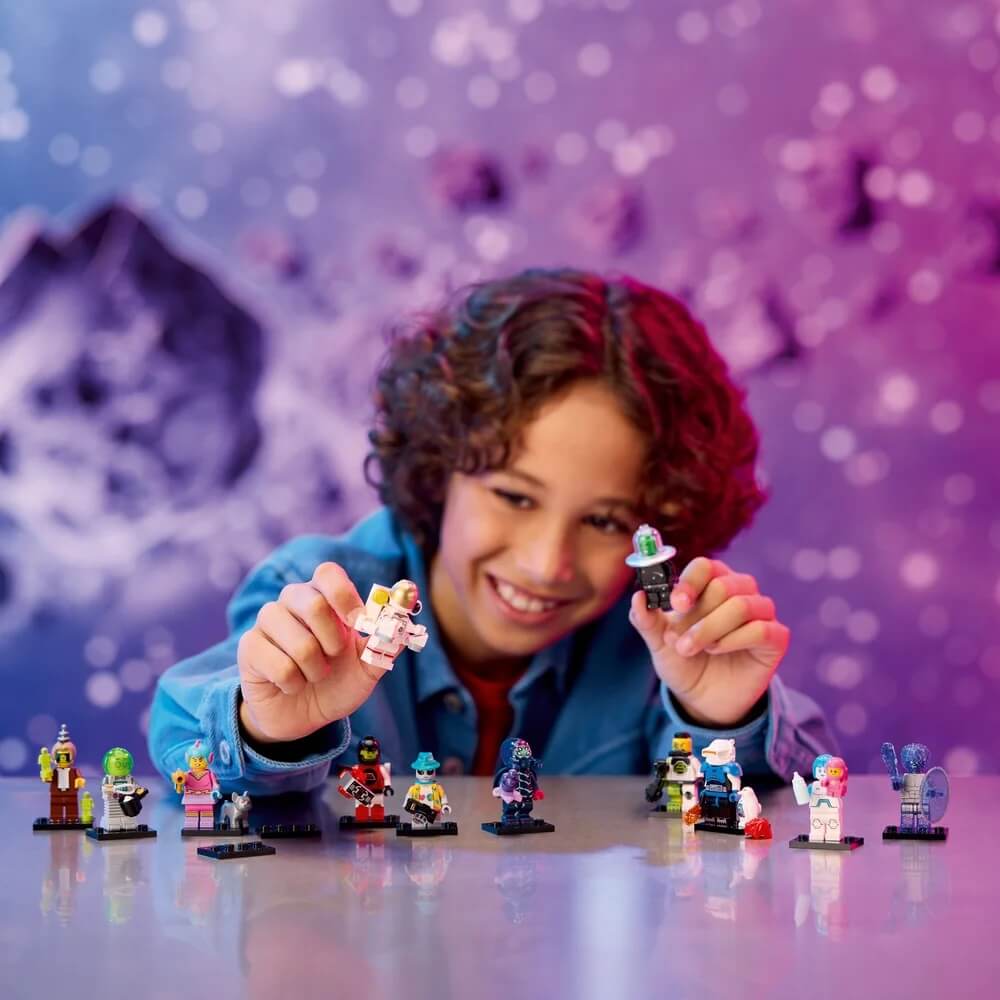 Another image of kid playing LEGO® Series 26 Space 9 Piece Building Set (71046)
