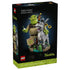 LEGO Shrek display set box features green Shrek, gray Donkey and orange Puss in Boots brick figures on a swamp base, with sunflowers and a Beware Ogre sign.