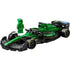 LEGO Speed Champions Aston Martin Aramco F1 model in green and black plastic with sleek open-wheel race car styling, plus a matching driver minifigure, displayed on a clean white background.