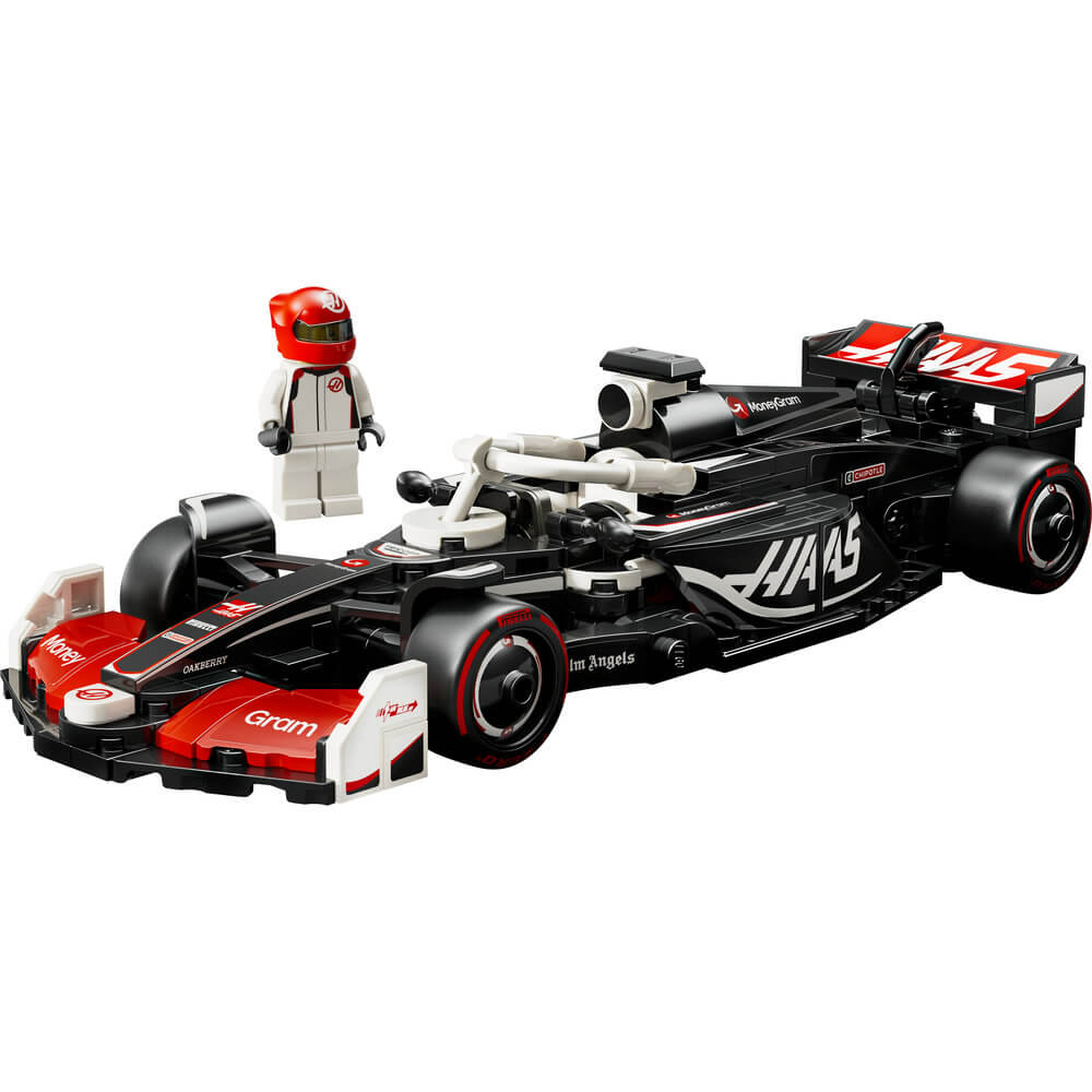 LEGO Speed Champions MoneyGram Haas F1 Team VF-24 model features black, red and white aerodynamic bodywork, a driver minifigure and racing details on a clean white background with authentic sponsor graphics.