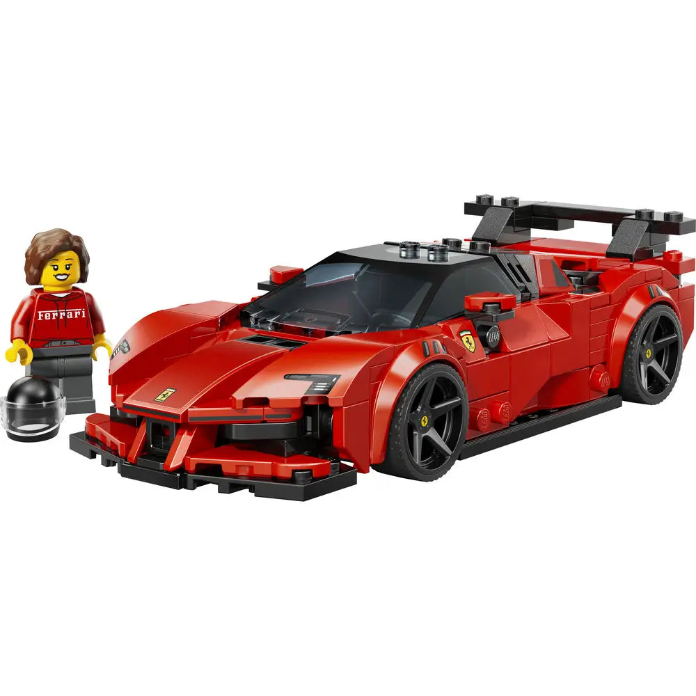 LEGO Ferrari SF90 XX Stradale supercar model in glossy red plastic with angular low-profile body, black aerodynamic accents, large rear wing, detailed headlights, and racing wheels, displayed beside a Ferrari-branded minifigure on a white background