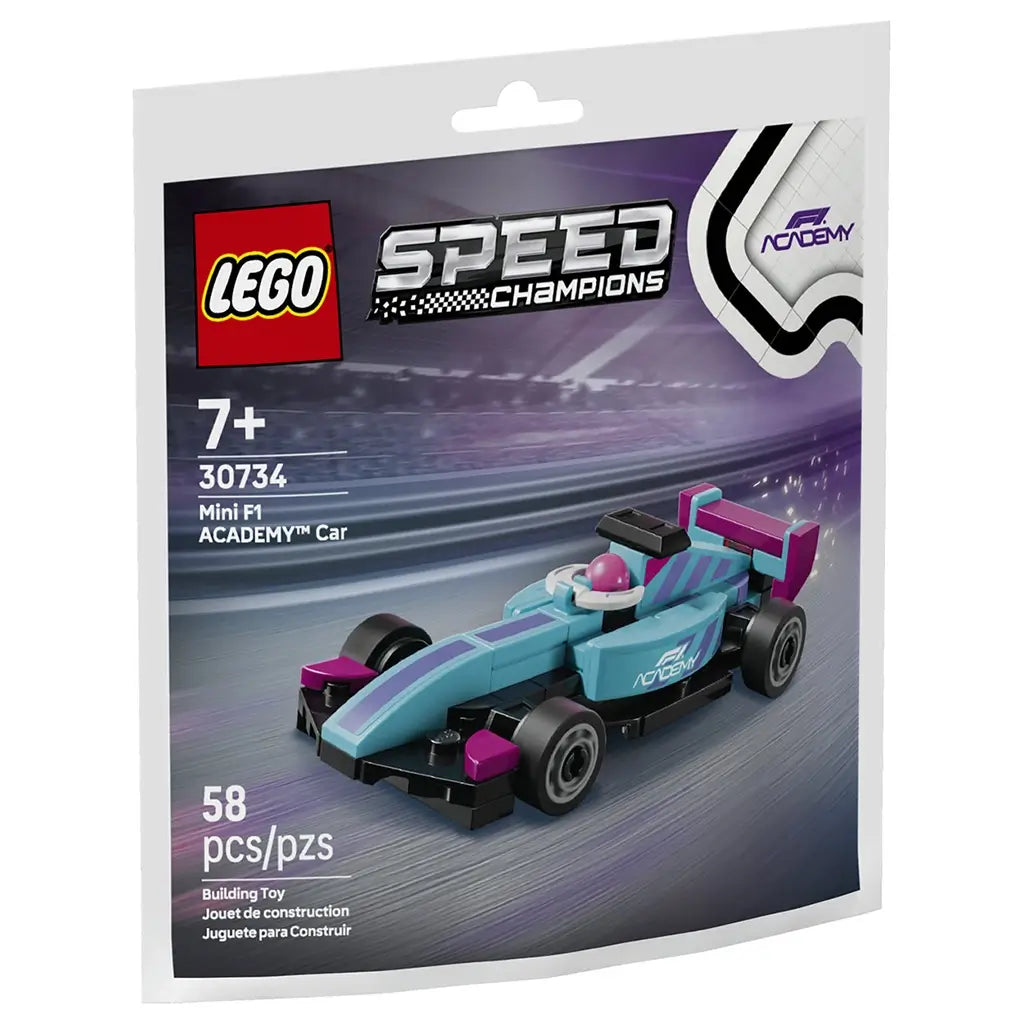 LEGO Speed Champions mini F1 car set features a light blue and purple plastic race car with black wheels, low aerodynamic shape, and compact open cockpit, designed as a small Formula-style vehicle, shown on branded packaging with motion track background.