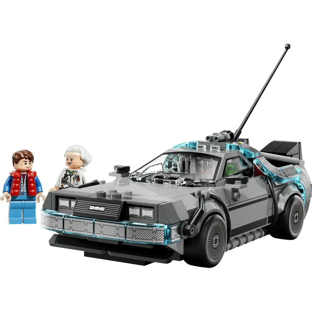 LEGO Back to the Future Time Machine DeLorean car in light gray plastic with angular body, translucent blue accents, rear-mounted reactor details, and extended antenna, displayed with Marty McFly and Doc Brown minifigures on a white background