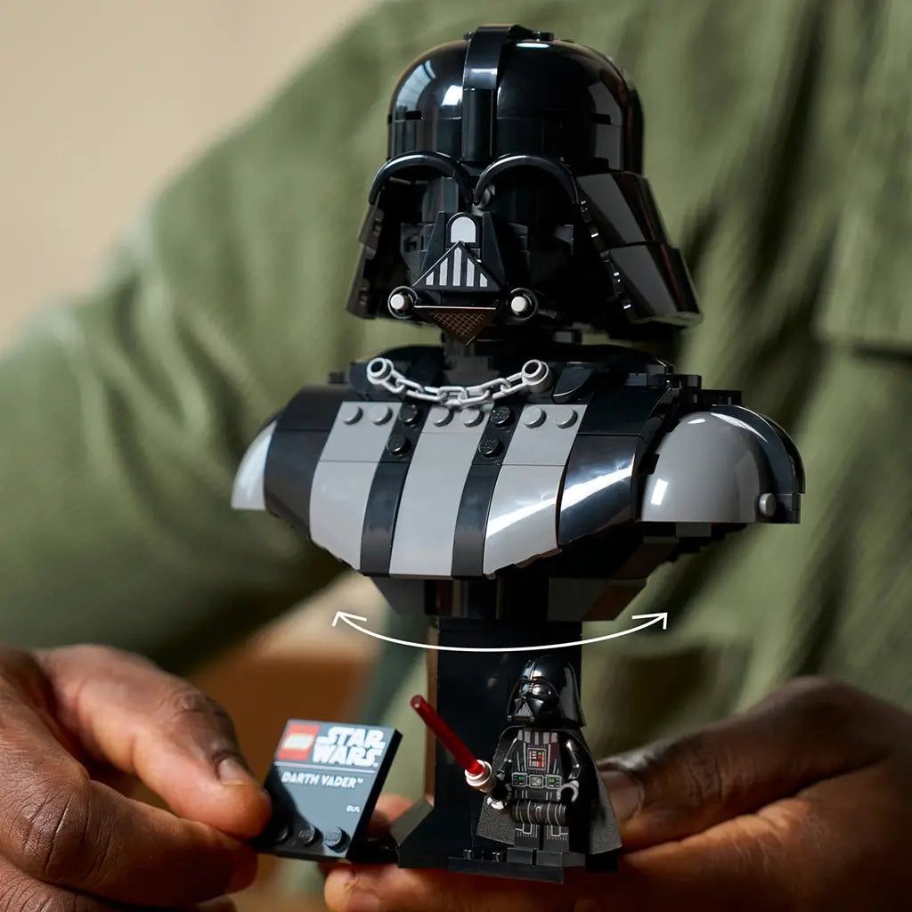LEGO Star Wars Darth Vader bust features glossy black plastic armor panels, a sculpted rotating helmet display, character plaque and minifigure, demonstrated in a tabletop setting.