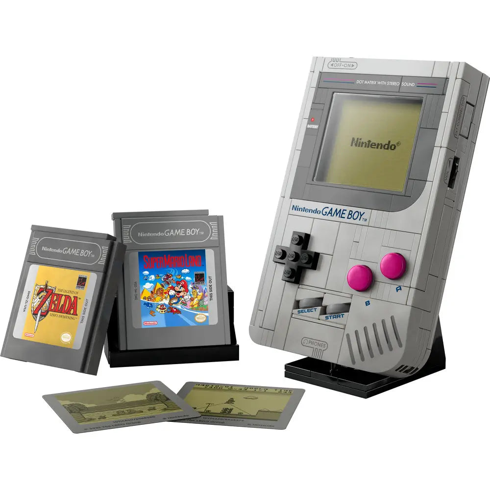 Complete LEGO Nintendo Game Boy set featuring the handheld console replica, two gray cartridge builds, and two printed game screen tiles replicating classic Nintendo titles.