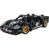 LEGO Technic Ford GT40 Mk II model features black plastic Technic panels with white racing stripes, gold wheels, low aerodynamic body, number two decals, and detailed headlights displayed on a clean white background.