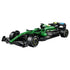LEGO Technic Aston Martin Aramco AMR25 F1 car in green and black bricks has aerodynamic wings, detailed suspension, sponsor graphics and racing tires on white.