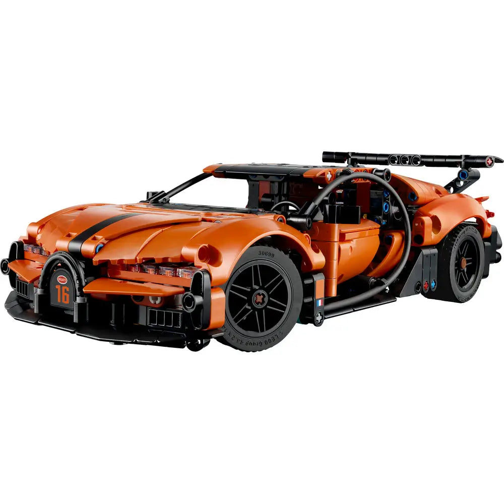 LEGO Technic Bugatti Chiron Pur Sport model features orange and black plastic Technic panels with low aerodynamic body, curved side profile, detailed headlights, black wheels, and rear wing displayed on a clean white background.