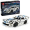 LEGO Technic Dodge Viper GTS-R set shows a white plastic race car with blue stripes, black wheels and rear wing displayed in front of its retail box on white.