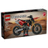 LEGO Technic Ducati Desmo450 MX Factory 42238 box shows the red, black, and gold 457-piece motorcycle model against a rugged desert landscape with Ducati branding.
