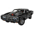 LEGO Technic Dodge Charger R/T in black plastic bricks with silver wheels, four round headlights and exposed supercharger, shown from the front on a white background.