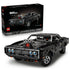 LEGO Technic Dodge Charger R/T in black plastic bricks with silver wheels and exposed supercharger, displayed with its Fast & Furious 42231 retail box on white.