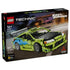 LEGO Technic Fast & Furious Mitsubishi Eclipse set in lime green and blue plastic bricks, pictured as a race car on the 827-piece 42229 retail box against a blurred street.