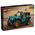 LEGO Technic Jeep Wrangler Rubicon set features a teal and black plastic off road SUV with rugged textured tires, orange rims, and detailed mechanical frame, designed as a realistic vehicle model, shown on branded retail packaging with desert background.