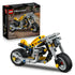 LEGO Technic yellow motorcycle set includes a bright yellow and gray plastic bike with black frame and rubber tires, paired with branded retail box, arranged on a clean white background for product presentation.