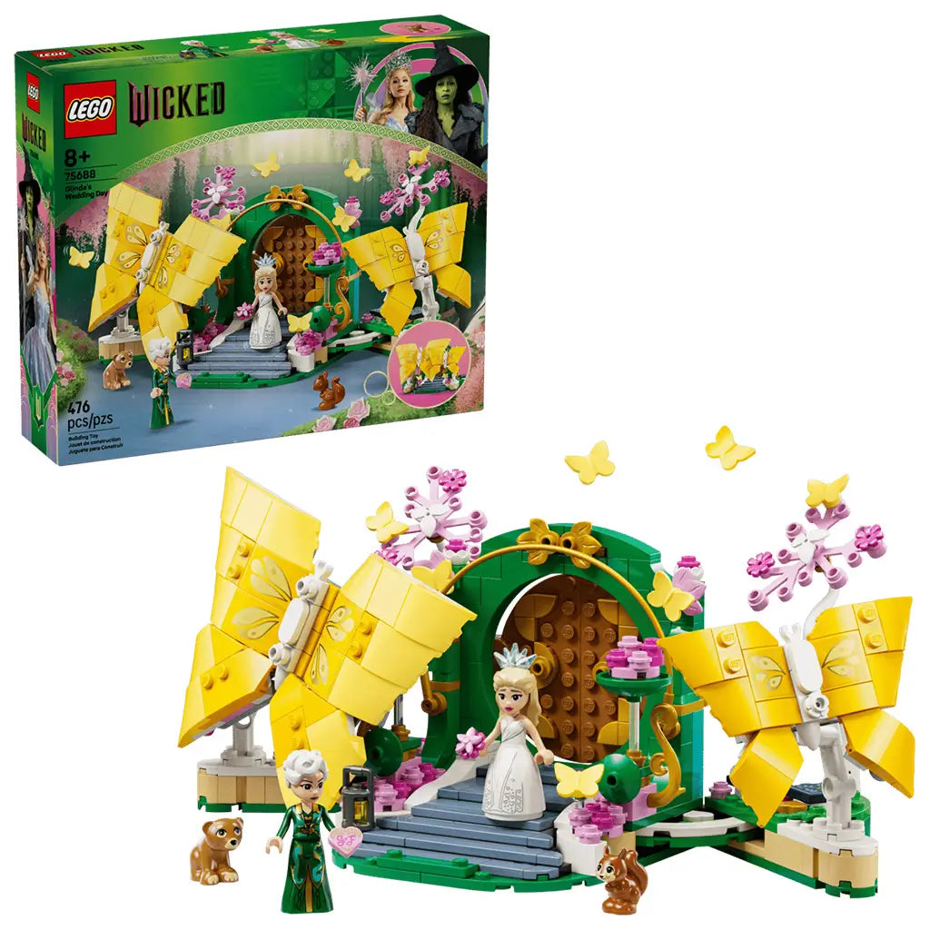 LEGO Wicked Glinda's Wedding Day building set features bright yellow butterfly models, green garden arch, pink blossoms, Glinda and Elphaba mini-dolls with animal figures on a clean white background.