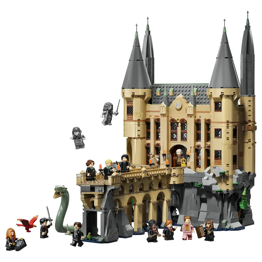 LEGO Harry Potter Hogwarts Castle East Wing set features tan brick towers with dark gray spires, a stone bridge, 12 minifigures, a basilisk, and magical creatures.