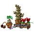 LEGO Harry Potter Hogwarts Herbology Plants set features green, red, brown, and purple brick models of a Mandrake, Mimbulus Mimbletonia, two Fanged Geraniums, and floral bench.