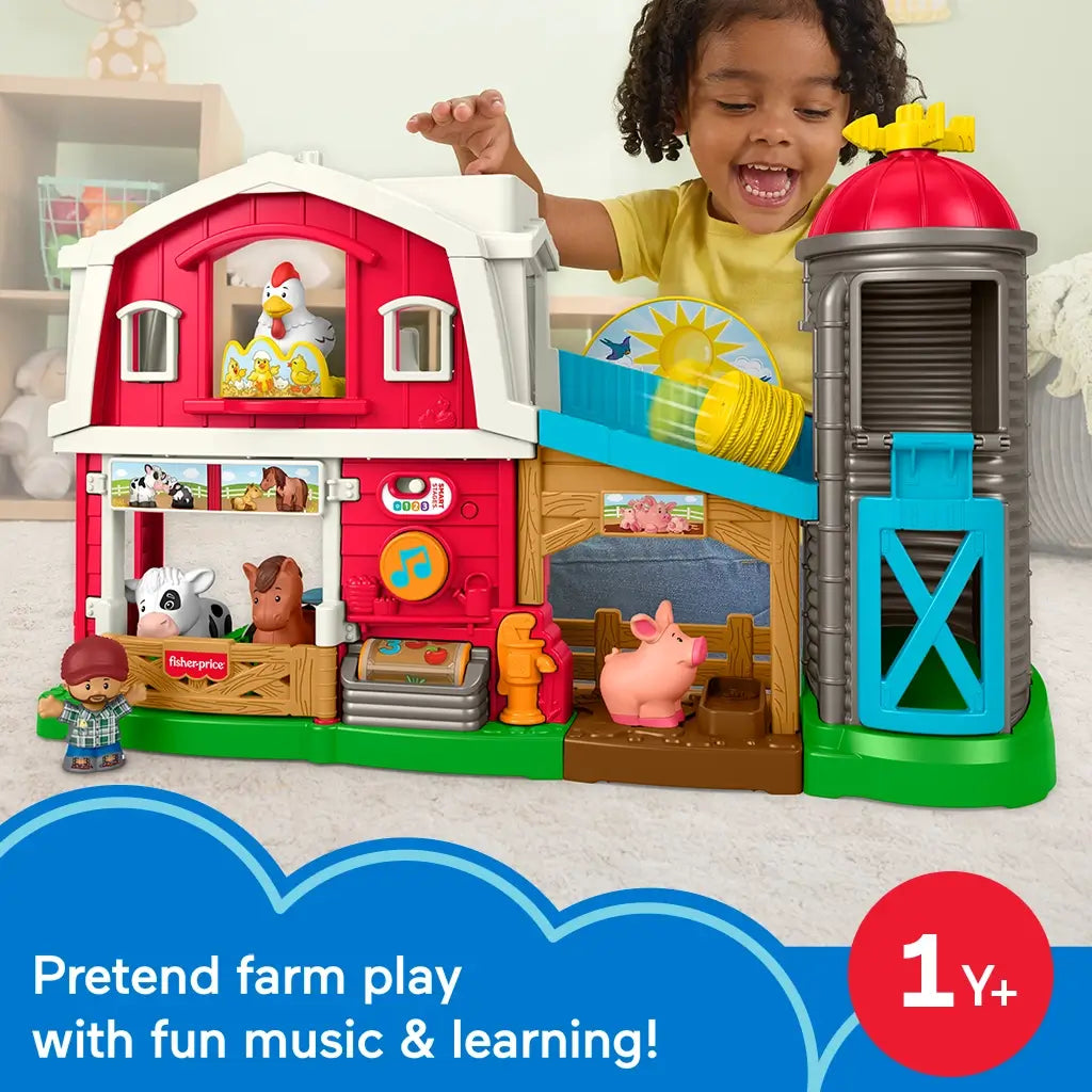 Toddler playing with the Fisher-Price Little People Caring Fun Animal Farm, enjoying pretend play with animals and farm sounds.