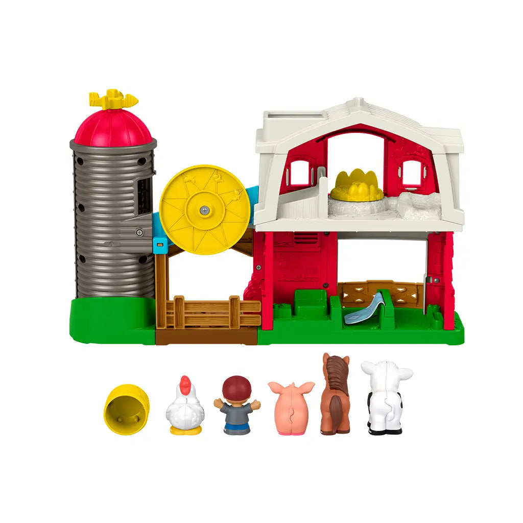 Rear view of Fisher-Price Little People Caring Fun Animal Farm playset showing internal structure, yellow slide, and included accessories.