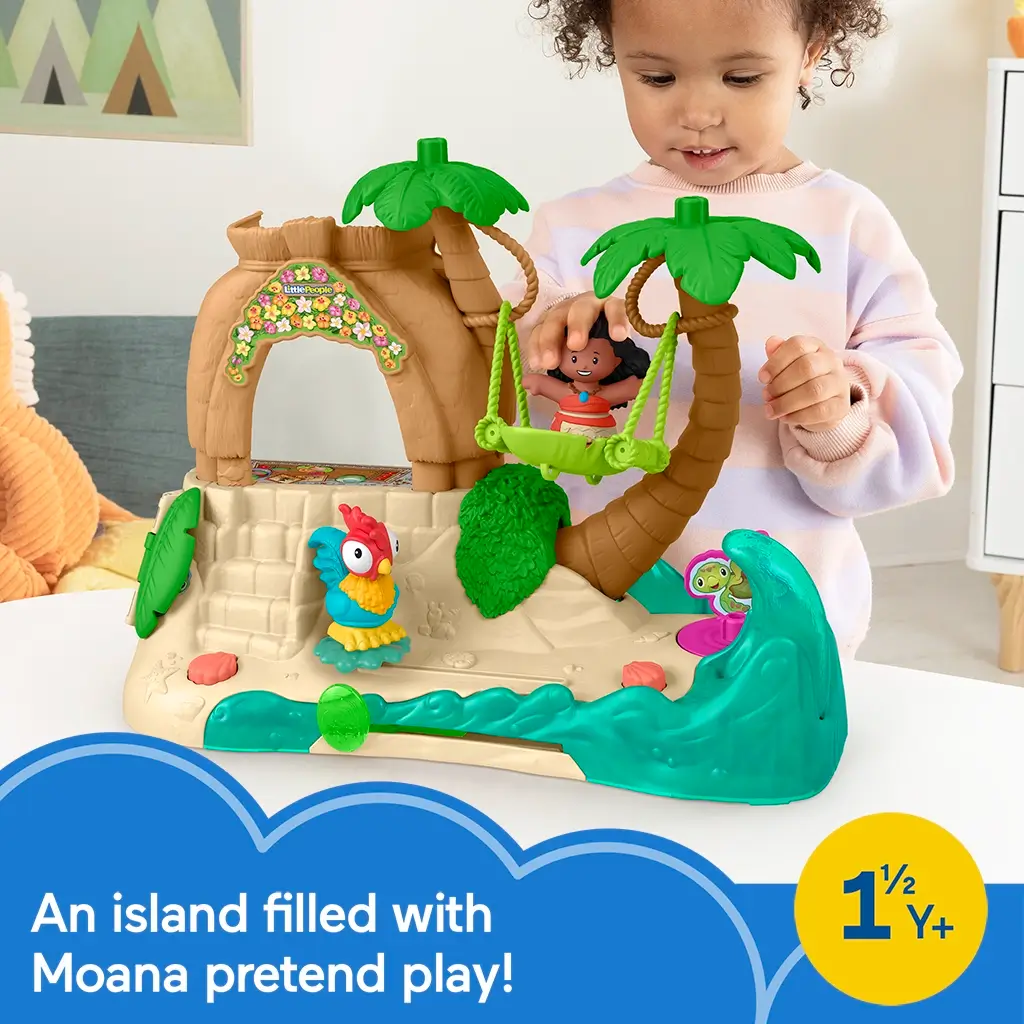 Toddler girl playing with Fisher-Price Little People Disney Moana Adventure Village playset featuring Moana and HeiHei figures, palm trees, and ocean wave design.