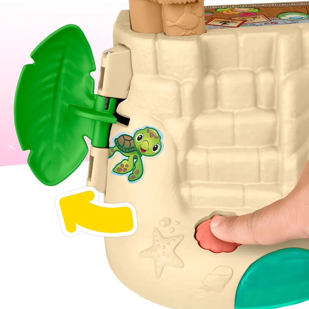 Close-up of Fisher-Price Little People Disney Moana Adventure Village playset showing a hand pressing coral-colored button to open green leaf door with turtle sticker detail.