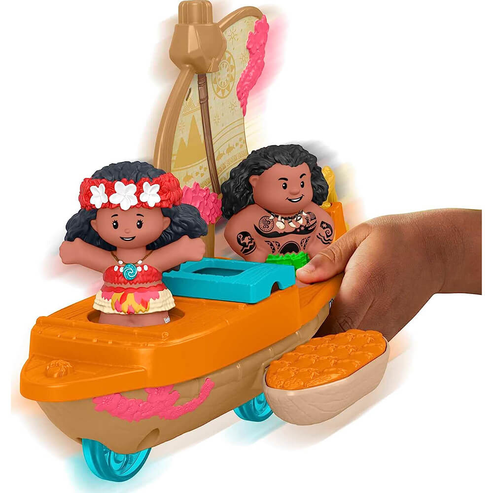 Hand playing with Little People Disney Princess Moana & Maui's Canoe Playset