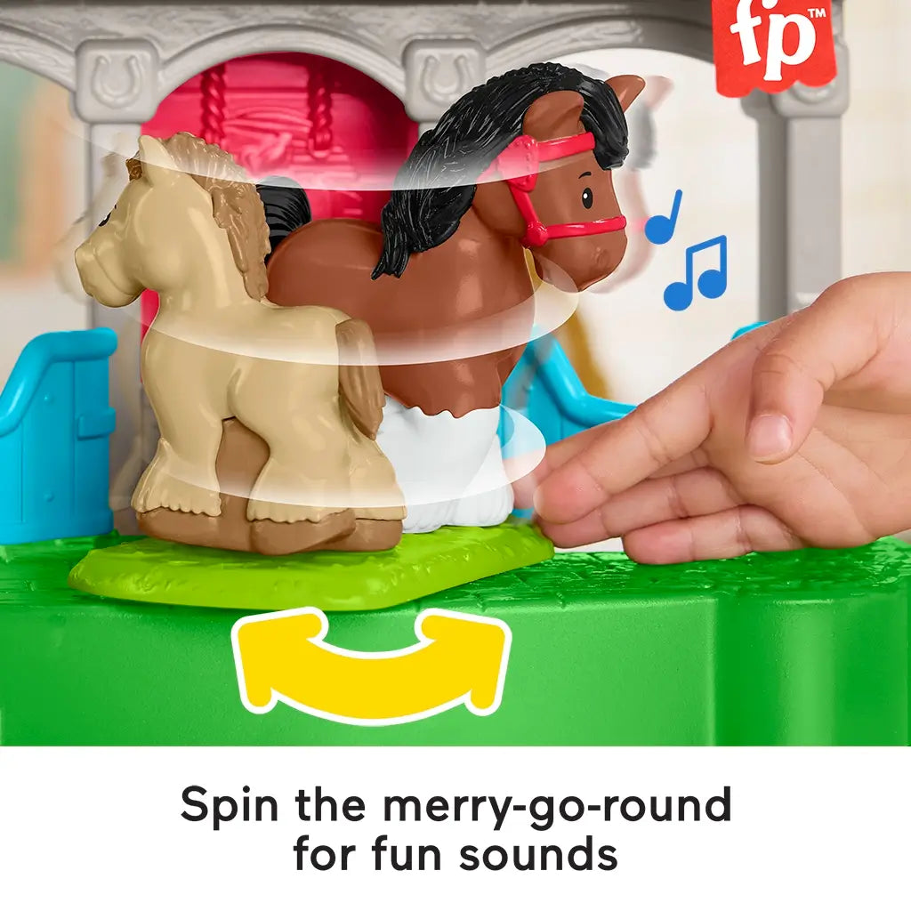 Fisher-Price Little People Friendly Horses Stable showing merry-go-round spinner for fun sounds with two horse figures.