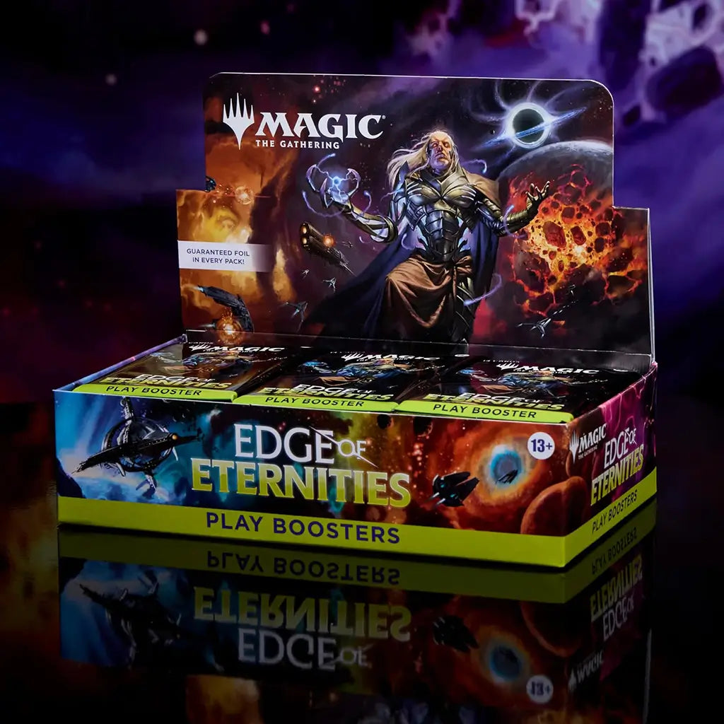 Magic: The Gathering Edge of Eternities Play Booster display box under dramatic lighting, highlighting the cosmic background, booster packs, and the prominent figure of a powerful spellcaster on the packaging.