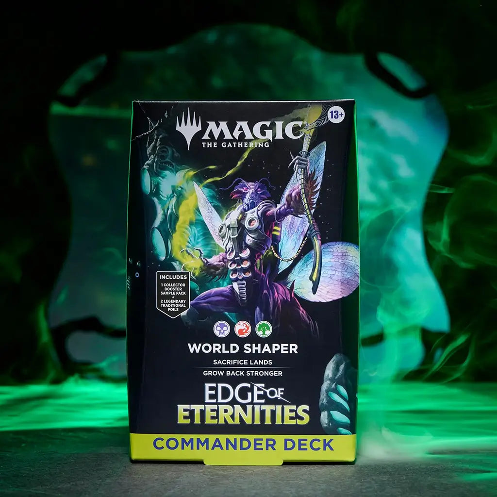 Stylized product display of the Magic: The Gathering World Shaper Commander Deck box featuring glowing green smoke and fantasy artwork. Highlights the inclusion of one collector booster sample pack and two legendary foil cards.