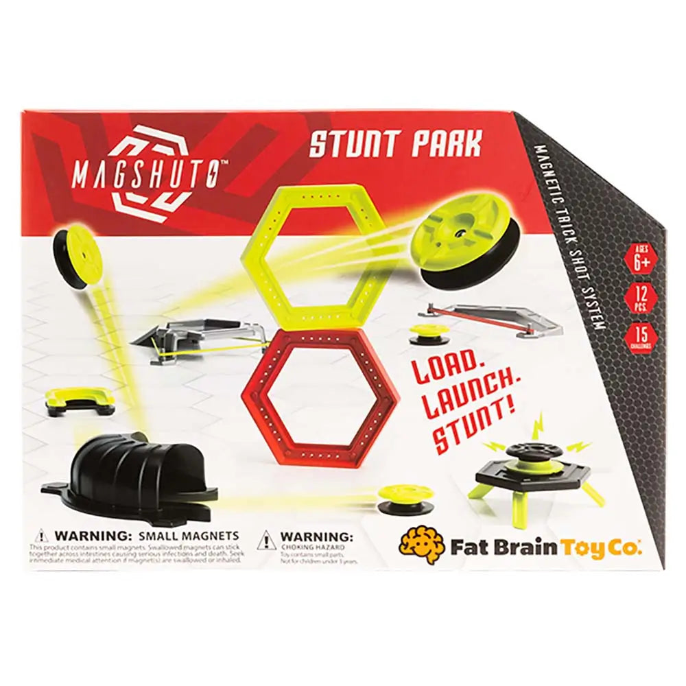 Magshuto Stunt Park magnetic toy set box in red, white, and neon yellow cardboard, showing hexagon targets, flying discs, launchers, and Fat Brain Toy Co. branding against a white backdrop.