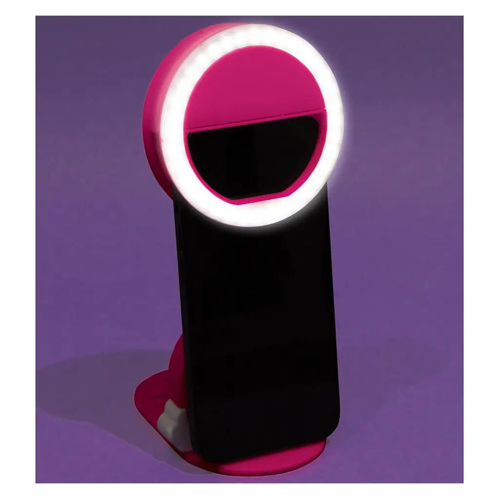 3C4G Tech Accessories clip-on selfie light glowing brightly on a phone, providing even lighting for selfies or videos against a purple background.