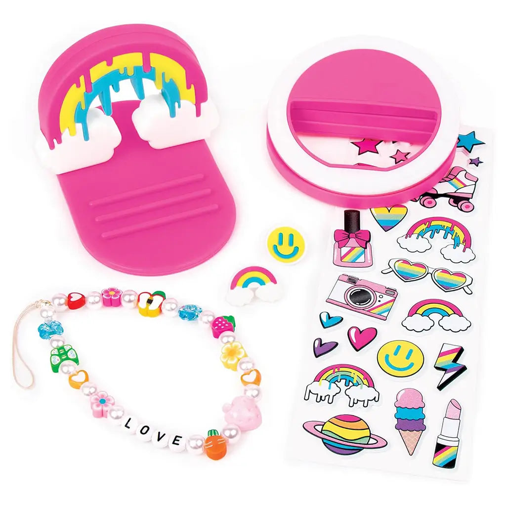 Contents of the 3C4G Tech Accessories Set including a rainbow phone stand, selfie light, puffy stickers, “LOVE” beaded bracelet, and cheerful earbud charms.