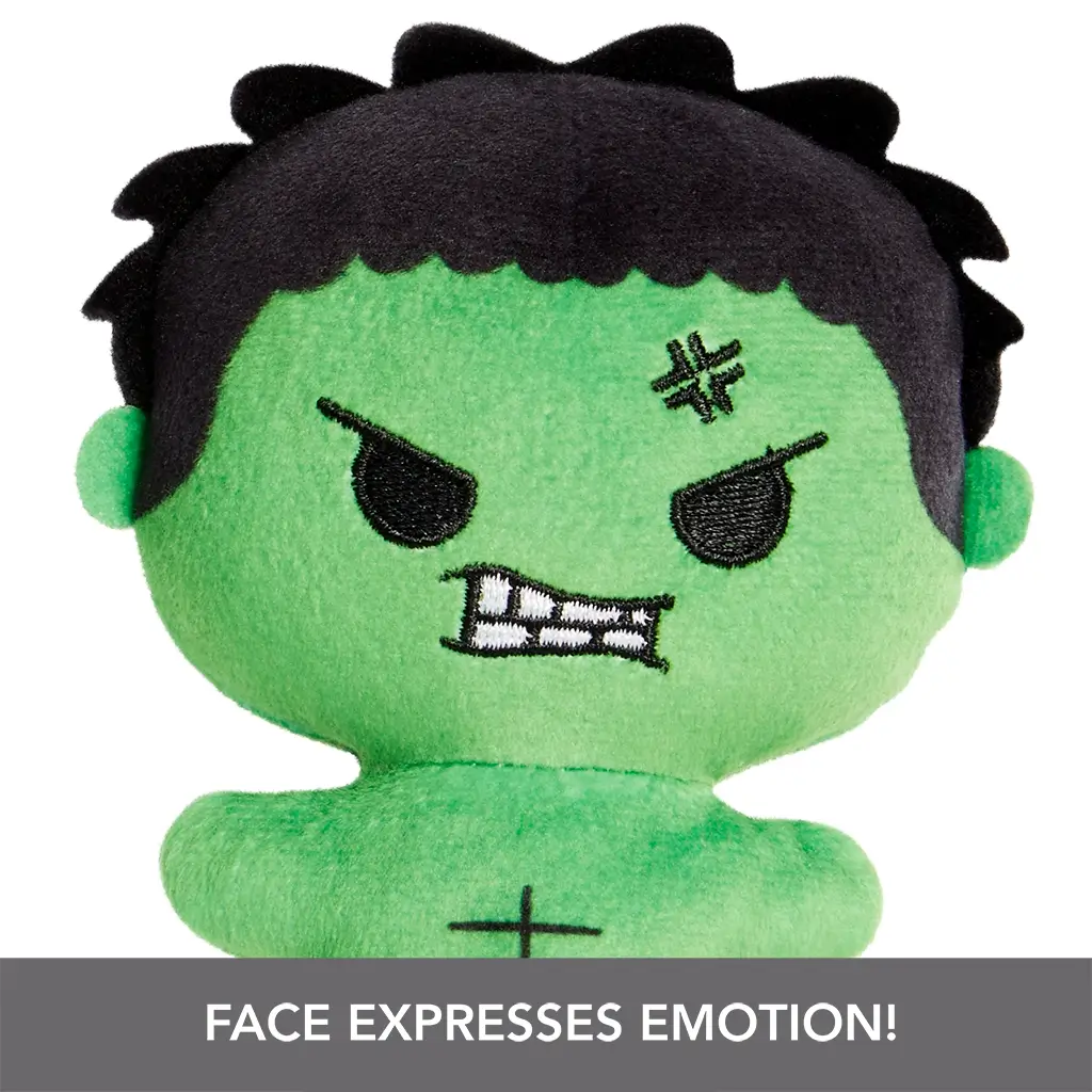 Close-up of Marvel Moodiverse Angry Hulk plush, green soft-textured toy with embroidered angry brows, clenched teeth, and black stitched hair, emphasizing strong emotional detail.