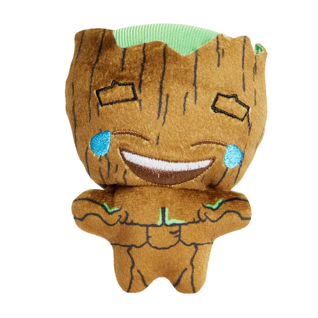 Front view of Marvel Moodiverse Laughing Groot plush, brown tree-like soft fabric with green crown, stitched smiling mouth and teardrop details, compact 4-inch collectible toy.