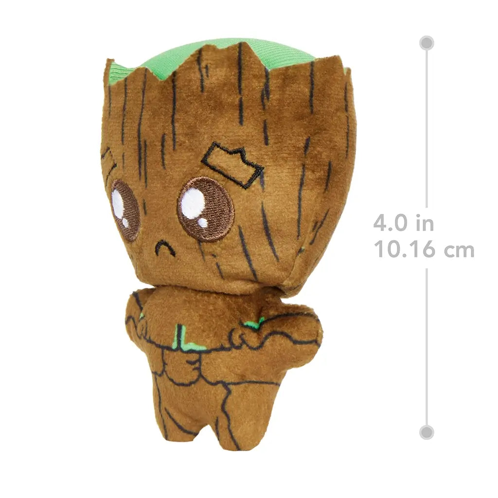 Marvel Moodiverse Series 1 plush toy of Baby Groot in brown soft fabric with stitched green details, showing sad expression, measuring 4 inches tall against a plain background.