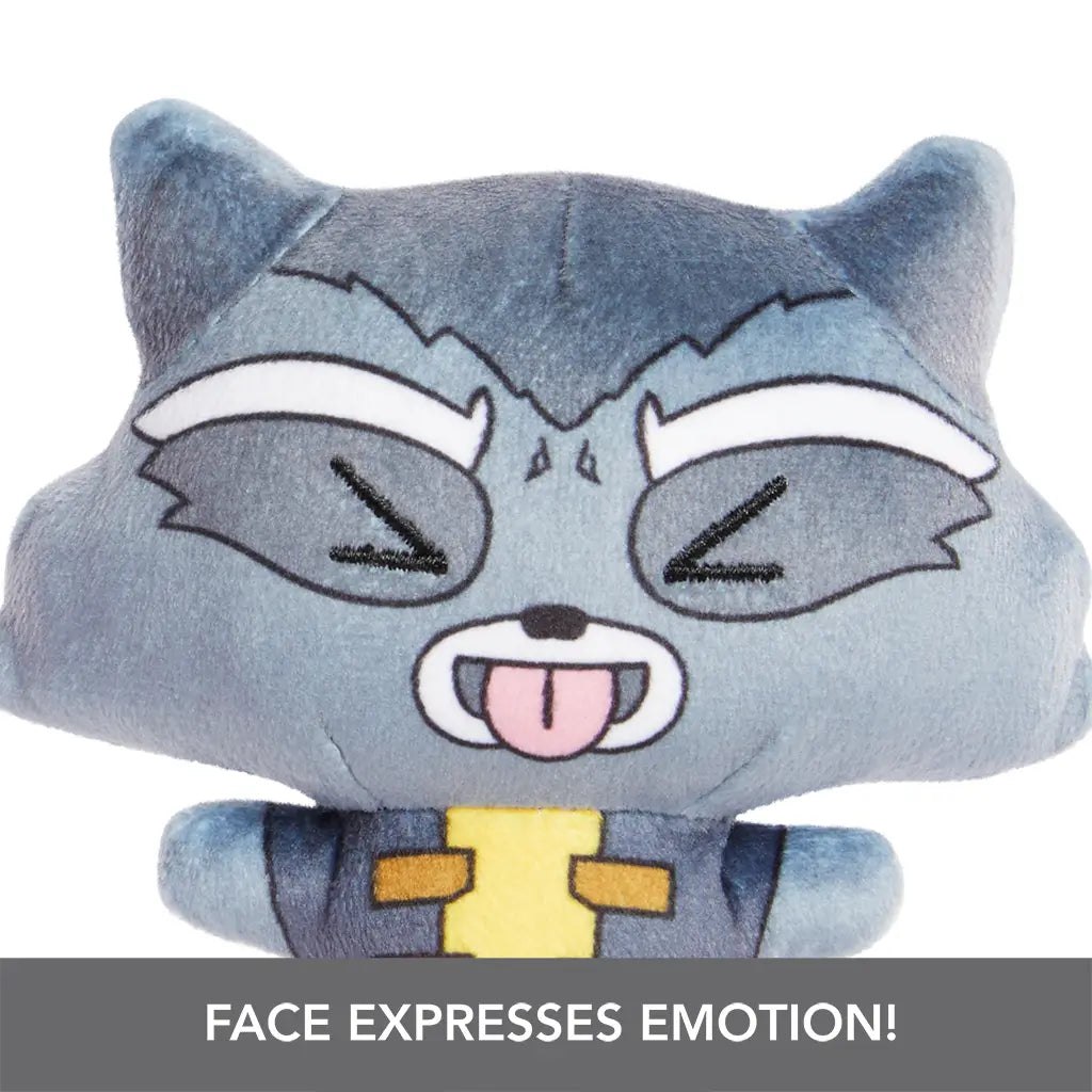 Gray plush Marvel Rocket Raccoon from Moodiverse Series 1, with stitched cartoon-style face, closed eyes, raised brows, and pink tongue sticking out, highlighting expressive design.